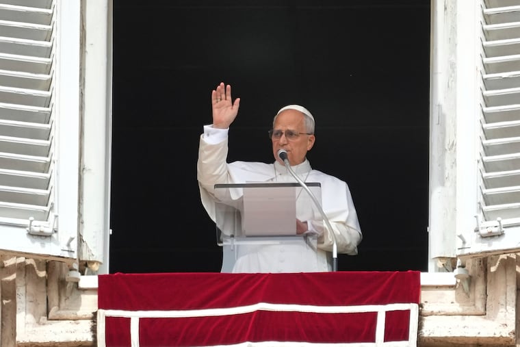 Pope Leo XIV appears at his studio’s window to bless the faithful gathered in St. Peter’s Square on Sunday.