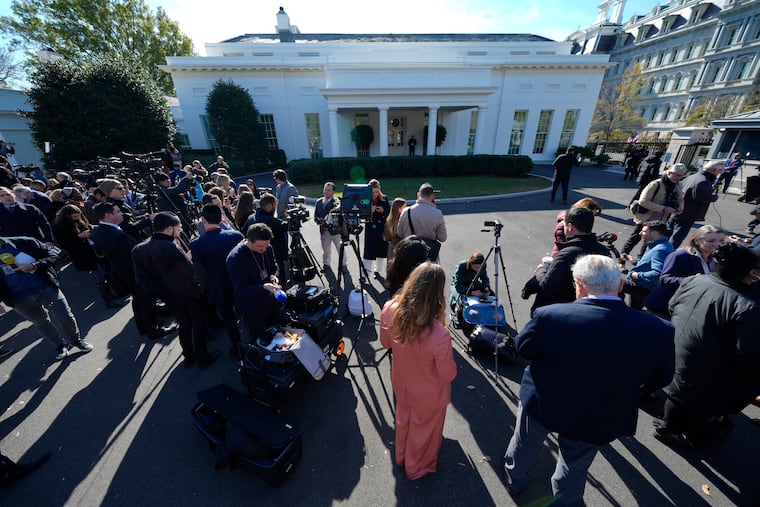 Members of the press gather outside the West Wing of the White House in Washington, Wednesday, Nov. 13, 2024, before President Joe Biden meets with President-elect Donald Trump in the Oval Office.