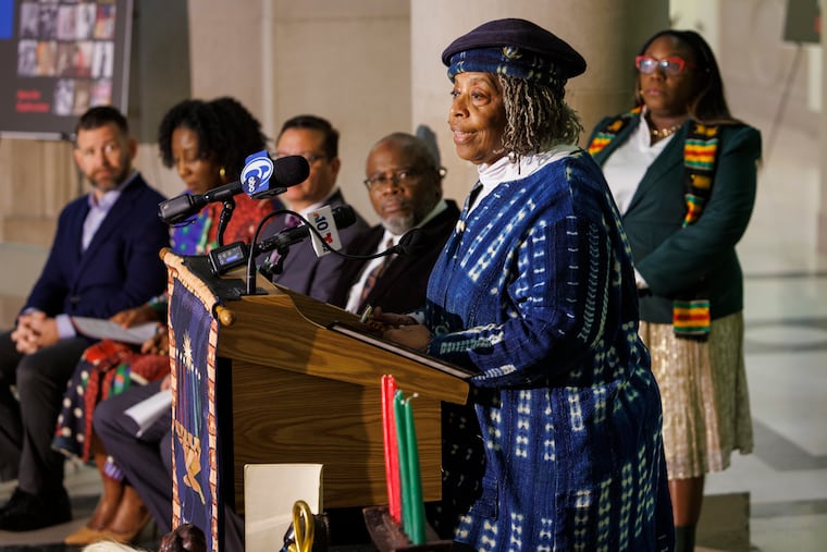 Mama Maisha Sullivan-Ongoza, of the Kwanzaa Cooperative addresses the attendees of a news conference introducing soon to be installed kinara sculpture that will bring Kwanzaa to the heart of Philadelphia.