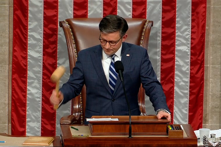 House Speaker Mike Johnson bangs the gavel after he announced the House voted to impeach Homeland Security Secretary Alejandro Mayorkas over the Biden administration's handling of the U.S-Mexico border.