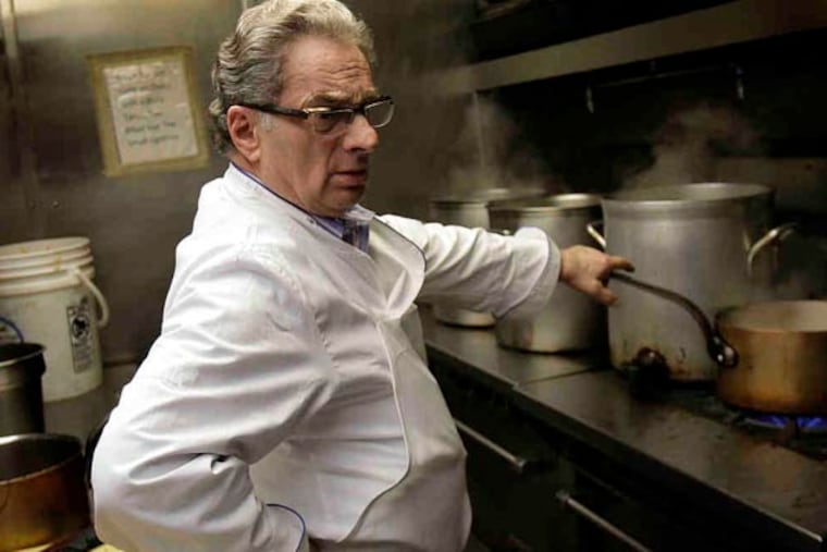 Chef Georges Perrier, owner of LeBec-Fin, cooks inside the landmark restaurant he created 40 years ago. The restaurant is located at 1523 Walnut Street in Philadelphia, Pa. on March 30, 2011. ( David Maialetti / staff photographer )