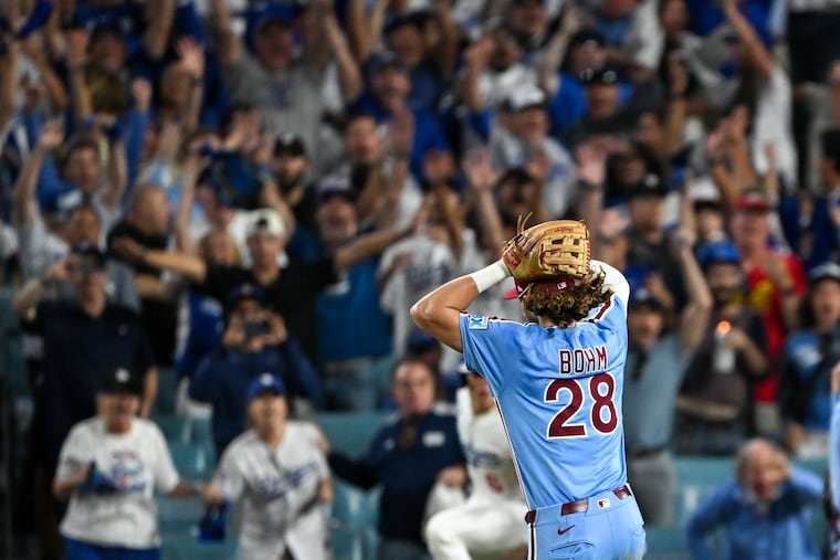 Phillies third baseman Alec Bohm reacts after the Dodgers won Game 4 of the NLDS on an errant throw home by pitcher Orion Kerkering.