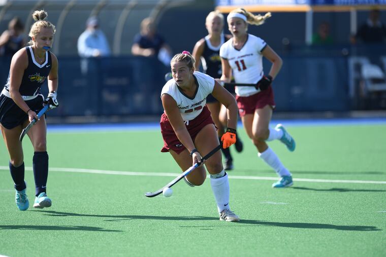 Lily Santi leads the St. Joseph's University field hockey attack.
