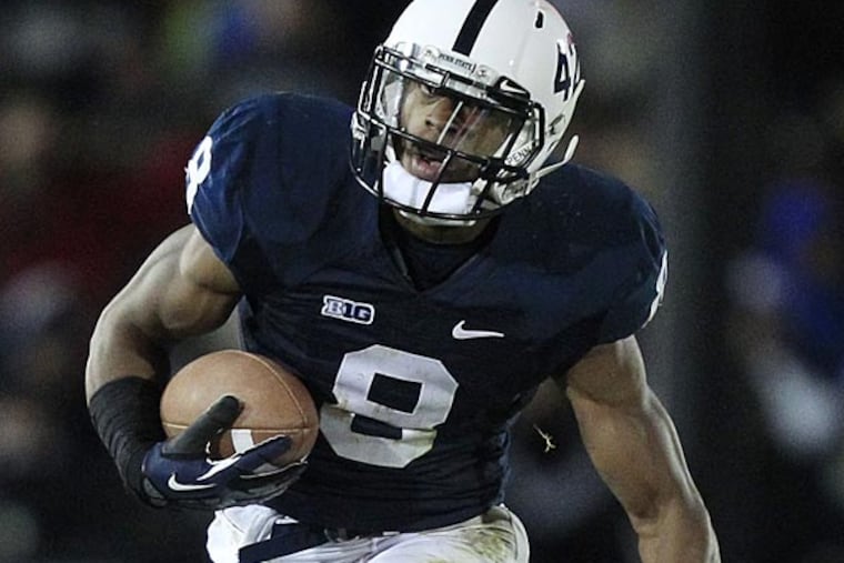 Penn State wide receiver Allen Robinson (8) runs after catching a pass
from Penn State quarterback Matthew McGloin (11) during the third
quarter of an NCAA college football game against Wisconsin in State
College, Pa., Saturday, Nov. 24, 2012. Penn State won in overtime
24-21. (AP Photo/Gene J. Puskar)