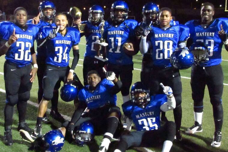 TED SILARY / DAILY NEWS STAFF Mastery Charter North seniors celebrate victory over Simon Gratz Charter.