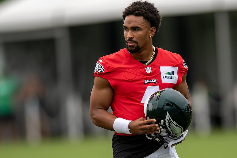 Philadelphia Eagles' Jalen Hurts looks on during training camp at the NFL football team's practice facility, Friday, July 29, 2022, in Philadelphia.
