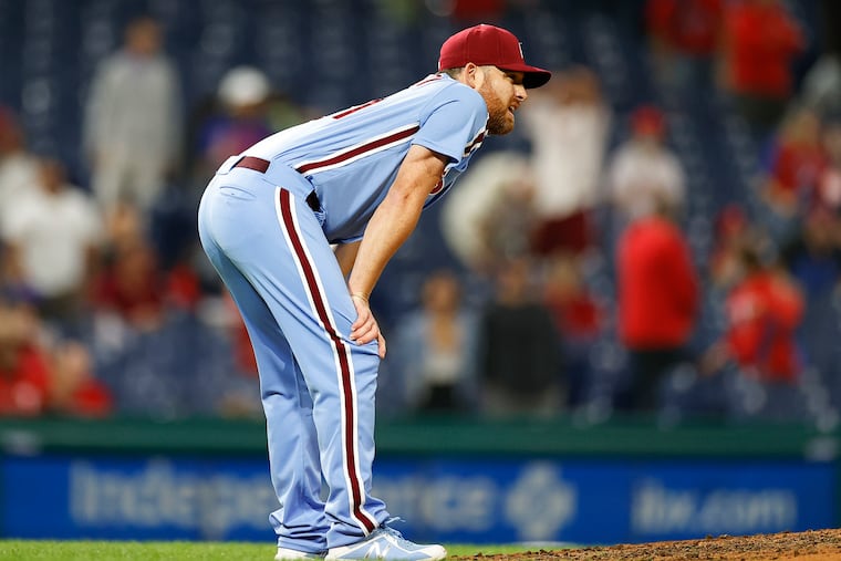 Phillies reliever Ian Kennedy reacts after allowing a two-out, two-strike home run to Colorado's Ryan McMahon in the ninth inning.