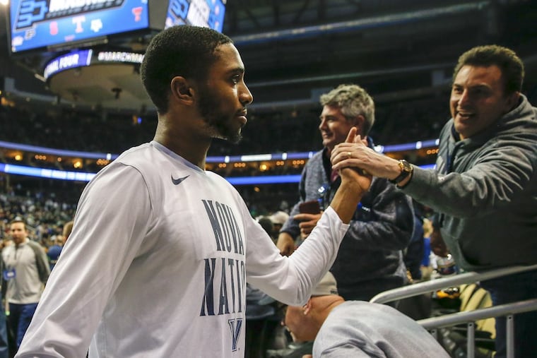 Villanova guard/forward Mikal Bridges celebrates Villanova’s second-round NCAA men’s basketball tournament win over Alabama with fans on Saturday, March 17, 2018 at PPG Paints Arena in Pittsburgh.