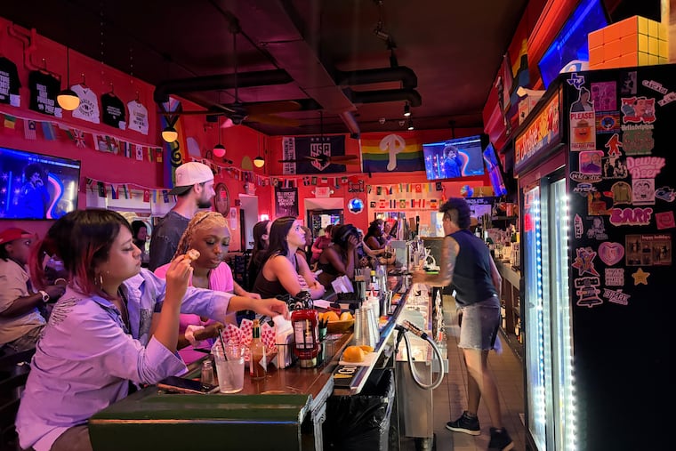 Fans take in the WNBA All-Star Game at Marsha's, a women's sports bar on South Street, on Saturday.