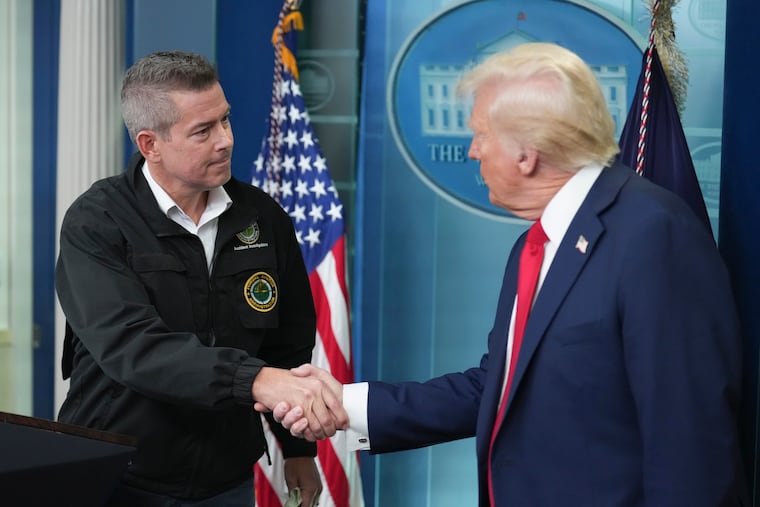 President Donald Trump shakes hands with Transportation Secretary Sean Duffy in the James Brady Press Briefing Room at the White House in 2025. Duffy is under scrutiny after he filmed a reality series funded by companies he regulates.
