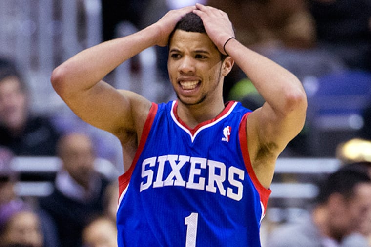 Point guard Michael Carter-Williams, recently named Rookie of the Year, heads into his second year with the 76ers next season. (Evan Vucci/AP)