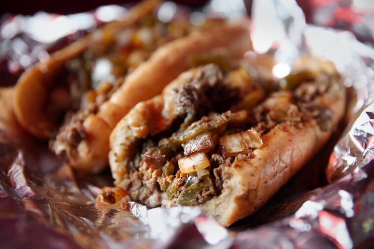 A cheesesteak with onions and peppers is pictured at Max's Steaks in North Philadelphia.