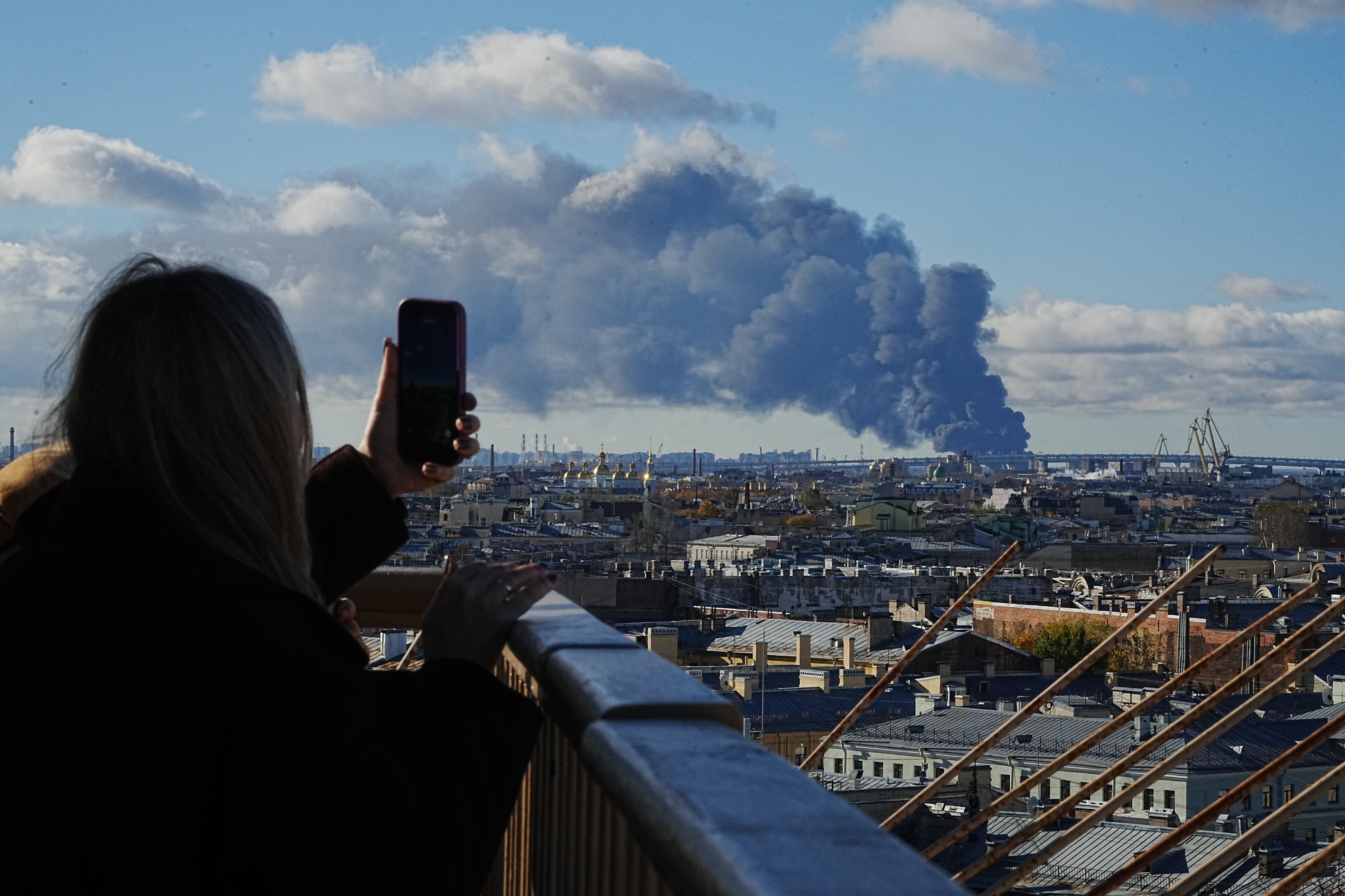 St Petersburg oil facilities ablaze as Ukraine launches more than 1,000 drones at Russia