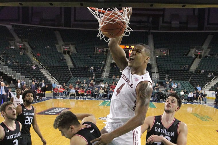 J.P. Moorman dunking against Davidson in December.