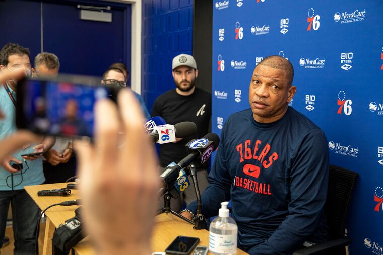 Sixers coach Doc Rivers speaks with the press after practice Tuesday in Camden.
