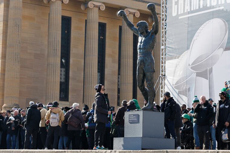 Eagles head coach Nick Sirianni looks at the Rocky statue during the Super Bowl LIX victory celebration at the Philadelphia Museum of Art in February.