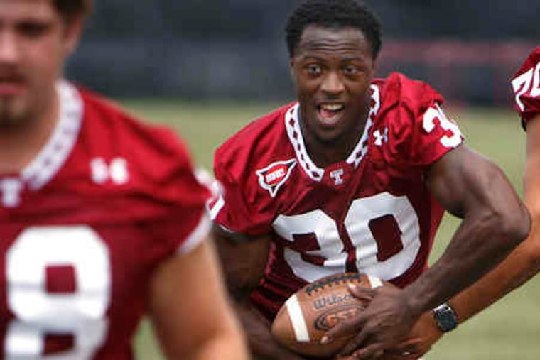 Temple's Bernard Pierce takes a handoff during practice on Thursday. He rushed for 1,361 yards and 16 TDs last season.
