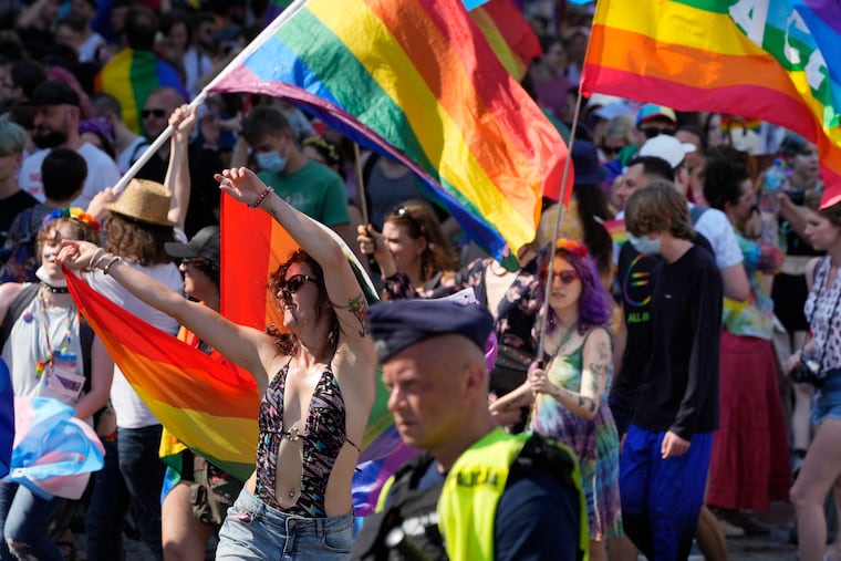 People take part in the Equality Parade, the largest gay pride parade in central and eastern Europe, in Warsaw, Poland, Saturday June 19, 2021. Despite the war in Ukraine, the country's largest LGBT rights event, KyivPride, is going ahead on Saturday, June 25, 2022. But not on its native streets and not as a celebration of gay pride. It will instead join Warsaw's yearly Equality Parade, using it as a platform to keep international attention focused on the Ukrainian struggle for freedom.