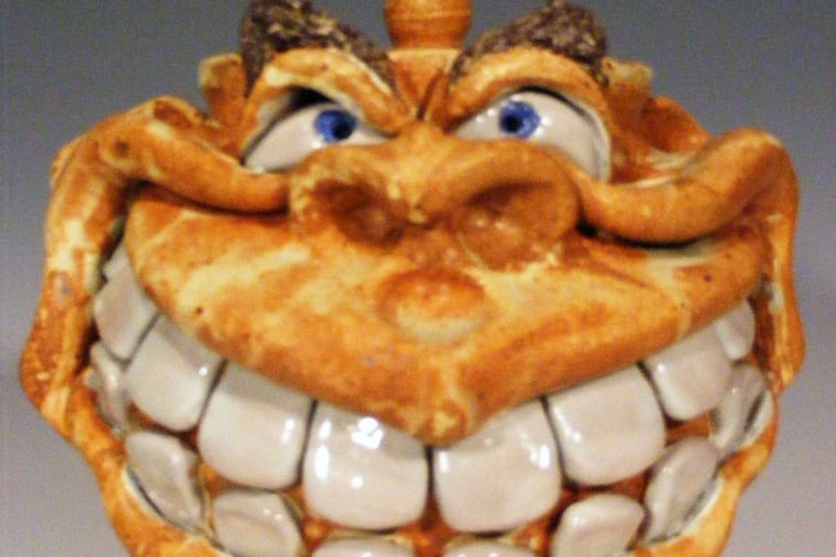 by Tom Phelps can be seen at Sugarloaf Crafts Festival .