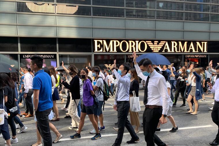 Middle-class Hong Konger call for investigation into police brutality against students.