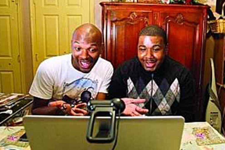 Makael Mclendon (left) and Kevin Simmons record an episode of 'The Skorpion Show' on Sunday in Simmons' home. The show has a profane, in-your-face style. (David Maialetti / Staff Photographer)
