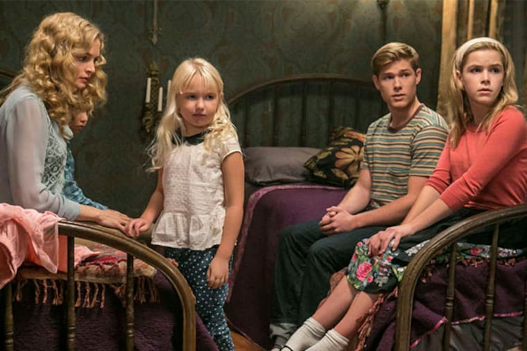 "Flowers in the Attic" stars Heather Graham (left) as mom Corrine Dollanganger, up above the rafters with children (from left) Carrie (Ava Telek), Christopher (Mason Dye) and Cathy (Kiernan Shipka).