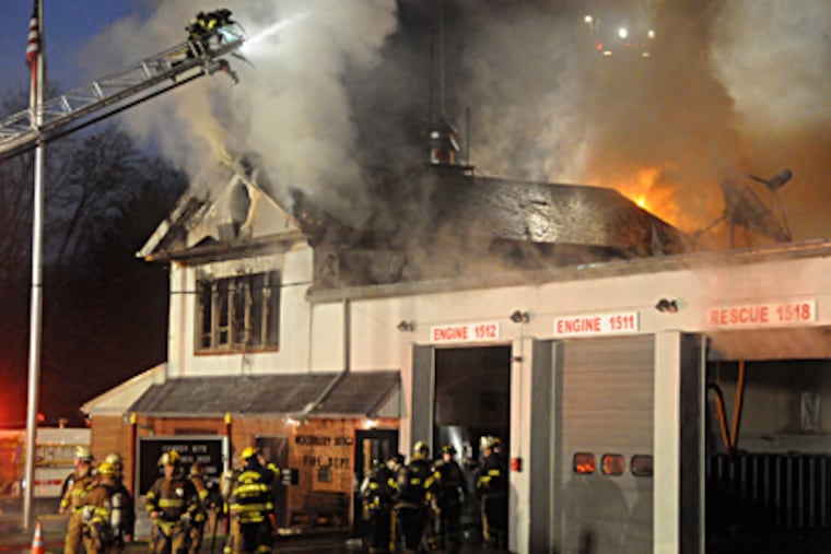 The Woodbury Heights fire station was heavily damaged early Friday morning. Federal and county agencies are investigating the blaze. CURT HUDSON / For the Inquirer