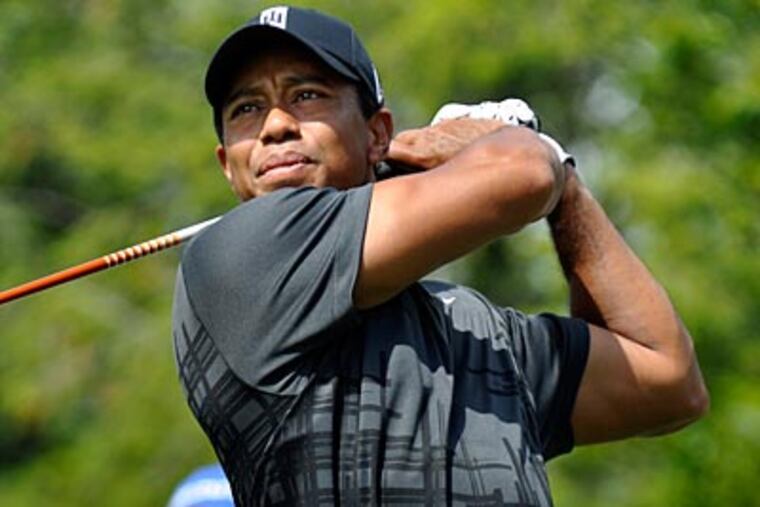 "He's not going to go away," Jack Nicklaus said in referring to Tiger Woods passing him in major wins. (Kevin Rivoli/AP)