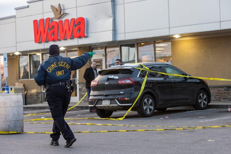 Philadelphia police investigate a fatal stabbing outside a Wawa in South Philadelphia.
