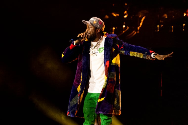 Meek Mill appears on the Rocky stage for a surprise performance at Made In America in Philadelphia, Pa., on Saturday, Sept., 4, 2021.