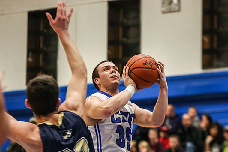 Chase Kumor of Conwell-Egan High School puts up a shot during La Salle High School's 66-58 win at Conwell-Egan in Fairless Hills on Friday. (Andrew Thayer/Staff Photographer)