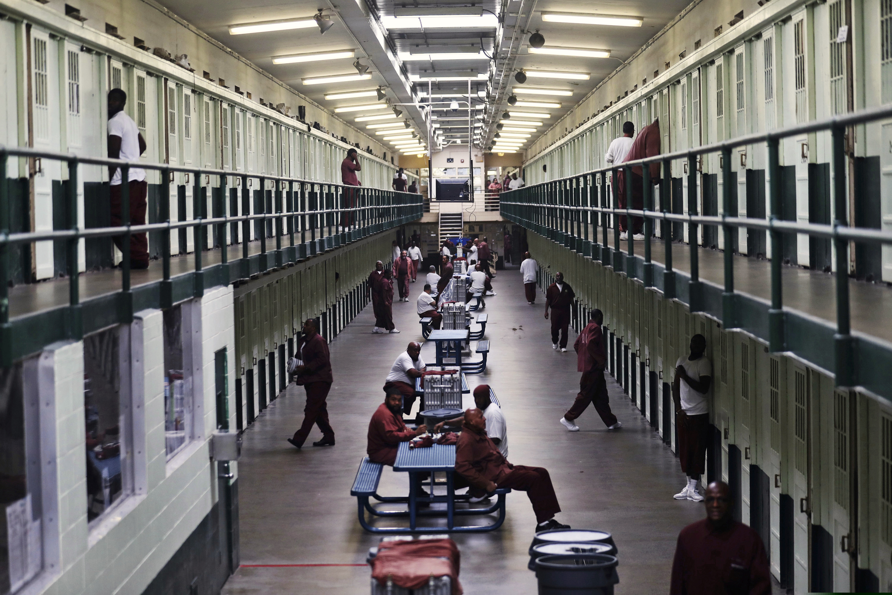 This Sept. 7, 2017, file photo, from before COVID-19 protocols, shows incarcerated people in a block at the State Correctional Institution at Graterford in Graterford, Pa. The Legislative Reapportionment Commission voted in August 2021 to count incarcerated people in their home districts, rather than where they are incarcerated.