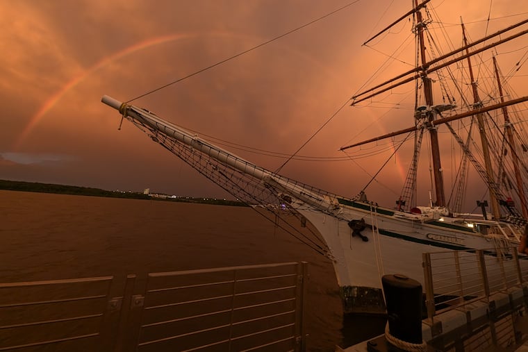 A rainbow arcs over Gazela’s bow in Alexandria, Va. Gazela is the official tall ship of Philadelphia.