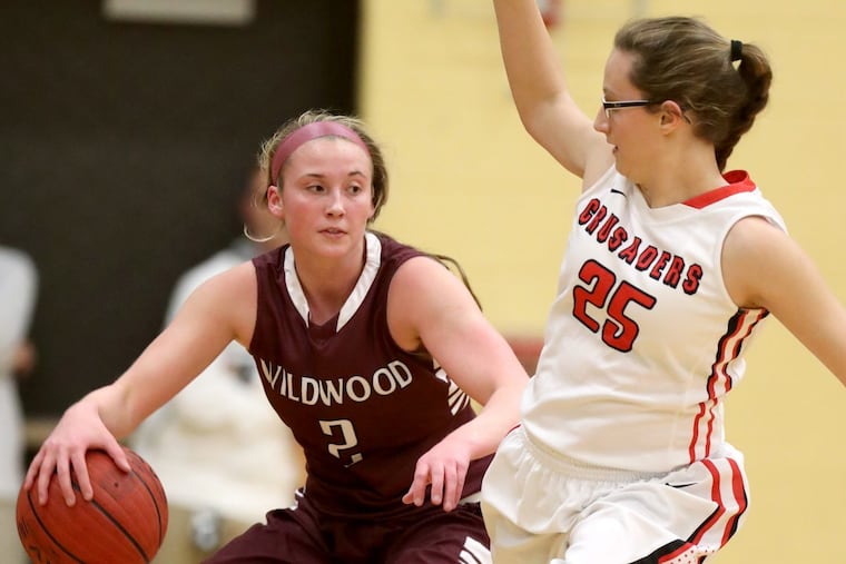 Wildwood's Maddie McCracken (left), pictured against Bound Brook in the Group 1 state semifinals last March, reached the 2,000-career points milestone during Monday's loss to Haddon Township in the South Group 1 final.