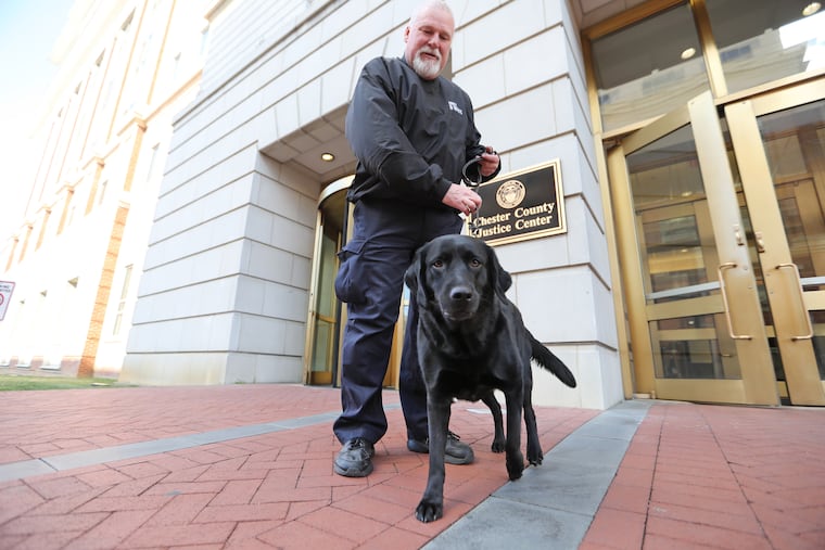Lt. Harry McKinney, seen here with in 2017 with "Melody," is at the center of a legal battle over the amount of overtime he accrued in the last three years.