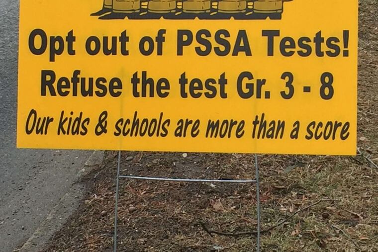 A sign urges parents to forego the Pennsylvania System of School Assessment tests for their children.