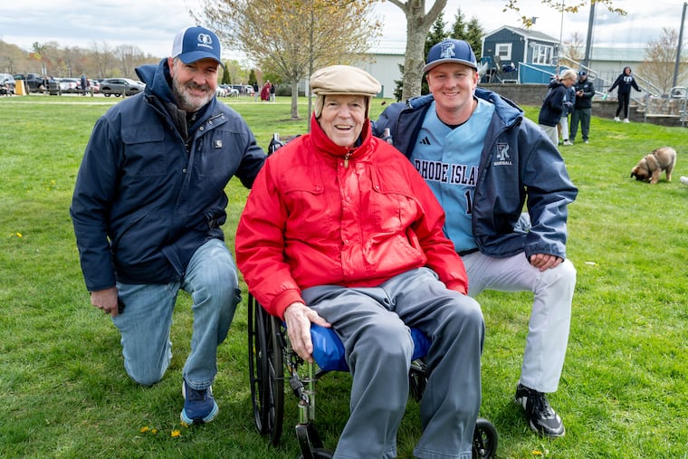 Dennis Maloney (center) is pictured with his grandson, University of Rhode Island pitcher Evan Maloney (right) and son Sean Maloney, after a game against Fordham on May 3rd.