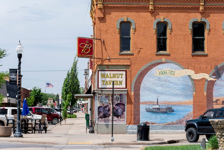 Downtown Yankton, S.D., where Charl Kleinhaus, an Afrikaner who immigrated from South Africa in 2025, has found work at a car dealership and brickyard.