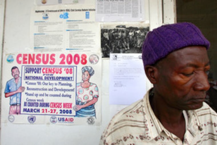 A census poster in Voinjama . Census workers have found that many villages on the 1984 map are deserted, the result of massacres.