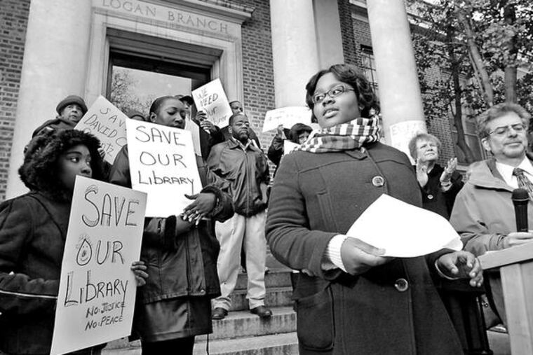 Tiara Fuller (foreground, in glasses), a ninth grader, is a plaintiff inthe planned suit. Lawyer Irv Ackelsberg (right) says City Council and not Mayor Nutter has the authority to close city facilities.