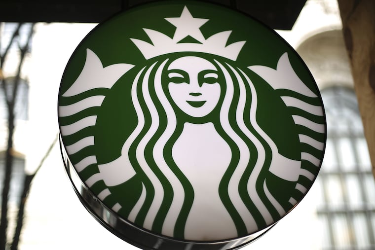 Starbucks sign from a shop in downtown Pittsburg. The company will be ridding plastic straws from worldwide locations by 2020.