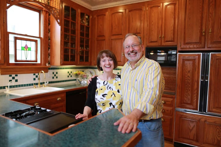 Bruce and Sylvia Wilson in the kitchen of their seven-bedroom Victorian home in Merchantville. They worked one room at a time. DAVID SWANSON / Staff