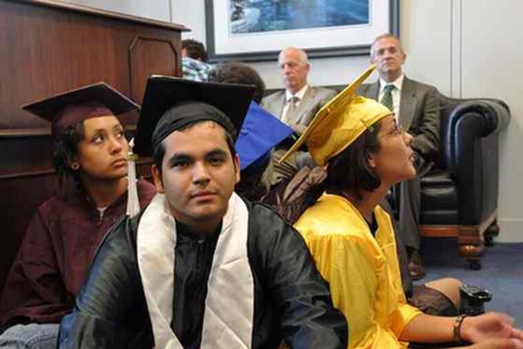 Photos: Courtesy of ERIN FLEMING / Kansas Missouri DREAM AllianceStudents stage a sit-in at Sen. Harry Reid's office in Washington to support the DREAM Act. They were later arrested.