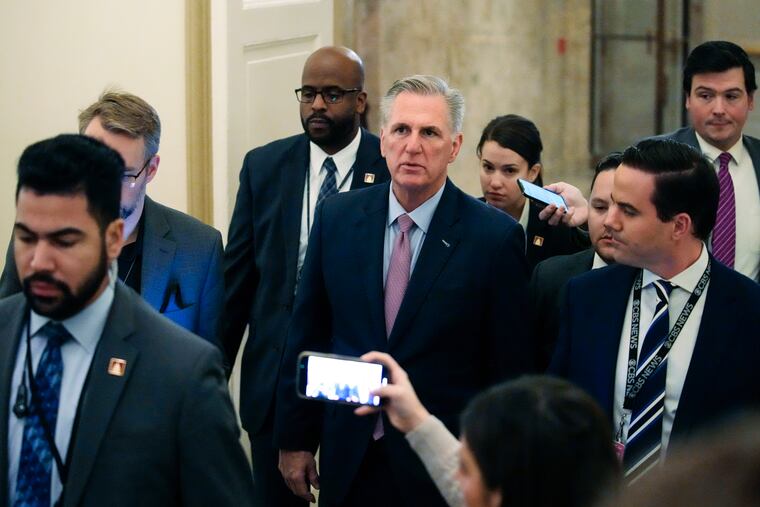 House Republican Leader Kevin McCarthy, R-Calif., arrives as the House meets for the fourth day to elect a speaker and convene the 118th Congress in Washington Friday.