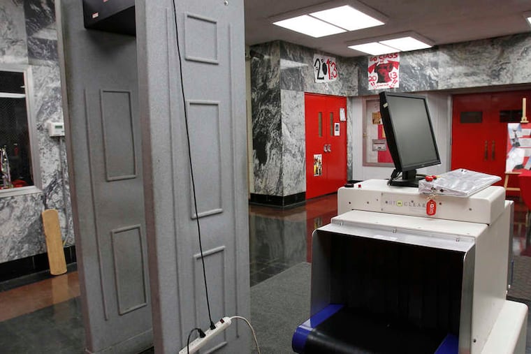 Mandatory, periodic weapons scanning is coming to all Philadelphia School District middle schools and elementary schools with middle grades, the district told families. Scans will happen with handheld wands or metal detectors, like the one shown in this file photo at South Philadelphia High School.