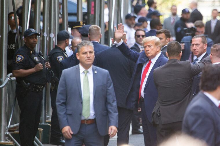 Former president Donald Trump arrives at Manhattan Criminal Courthouse earlier this month.