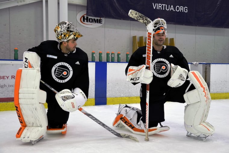 Michal Neuvirth (left) and Brian Elliott will be the Flyers’ goalies this season. (ZACK HILL / Philadelphia Flyers)