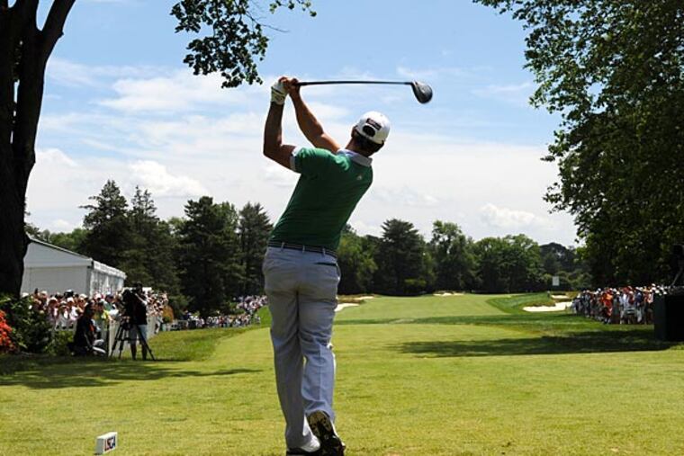 Adam Scott tees off during a practice round on Wednesday. (Clem Murray/Staff Photographer)