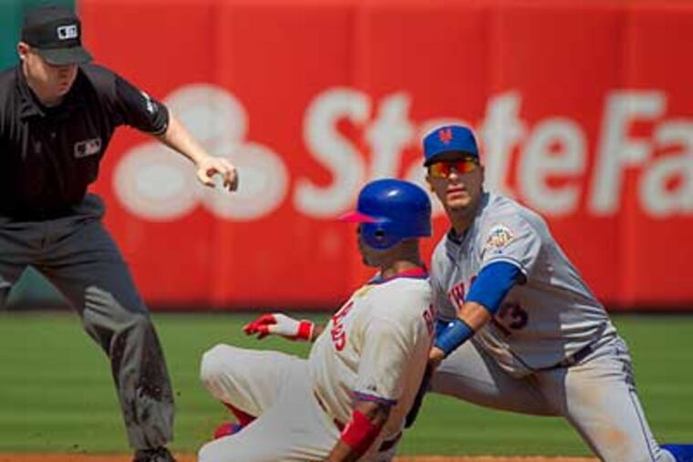 Jimmy Rollins was benched in the seventh inning of Thursday's win. (Ed Hille/Staff Photographer)