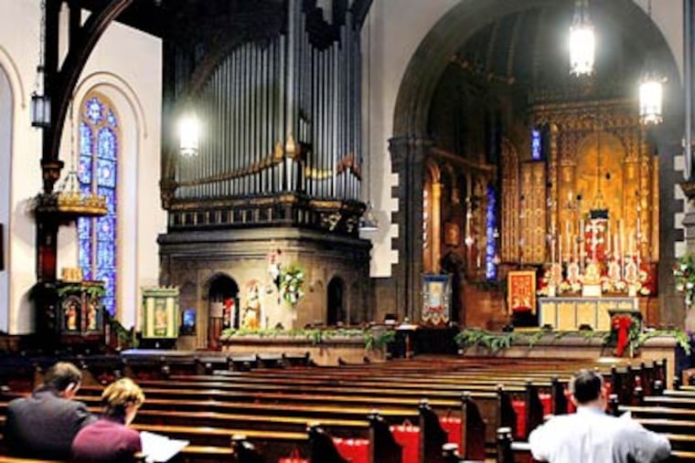 The Low Mass of the Dawn, also called the Shepherds’ Mass, at St. Clement’s Episcopal Church in Center City was attended yesterday by six worshipers. There is no singing or sermon, and the service lasts only 27 minutes. (Tom Gralish / Staff Photographer)